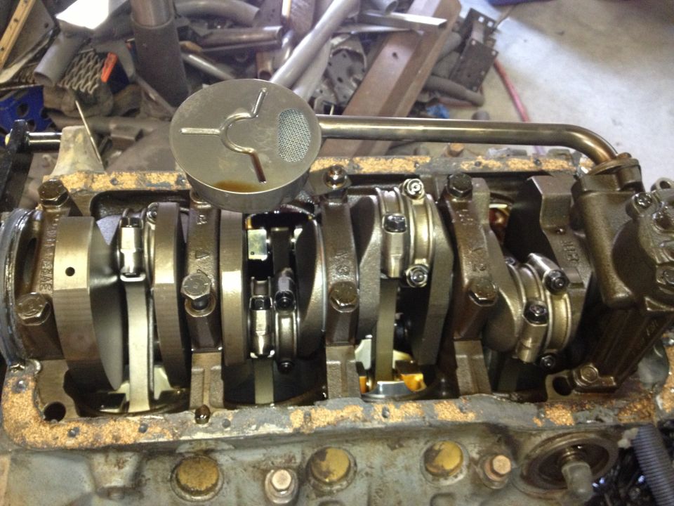 Engine crankshaft with connecting rods and oil pump pickup tube