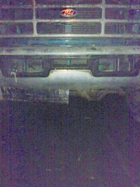 1996 Ford Bronco - Front view of a 1996 Ford Bronco, showing its grille and bumper details.