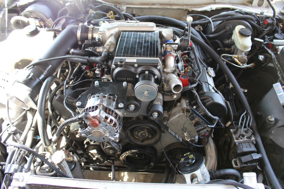 Kenne Bell supercharged engine with chrome alternator and brake master cylinder