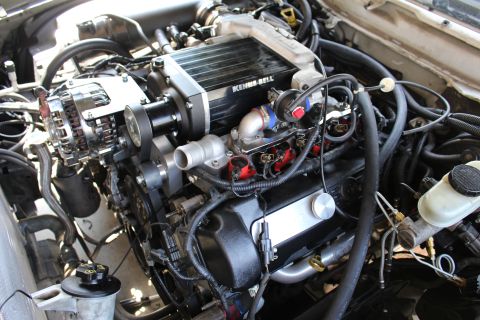 2003 Ford Crown Victoria - supercharged engine with a Kenne Bell blower, chrome alternator, black valve cover and brake master cylinder.