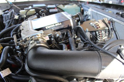 2003 Ford Crown Victoria - Kenne Bell supercharger with a polished chrome alternator and a large black intake tube in the foreground.