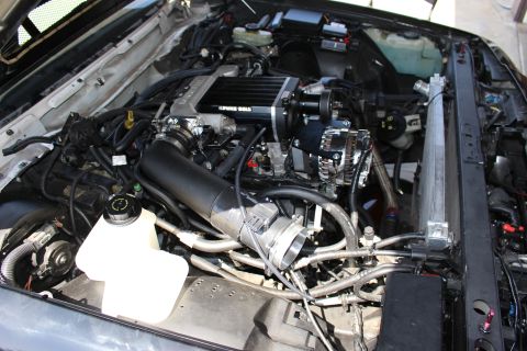 2003 Ford Crown Victoria - Kenne Bell supercharged engine with a routed intake tube, chrome alternator and coolant reservoir.