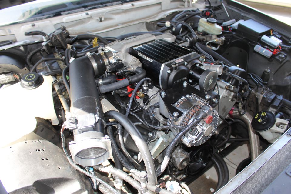 Kenne Bell supercharged engine with chrome alternator and intake