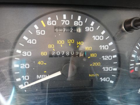 1993 Ford Taurus - The vehicle's odometer shows over 207,000 miles, and the trip odometer is set to 6-723.