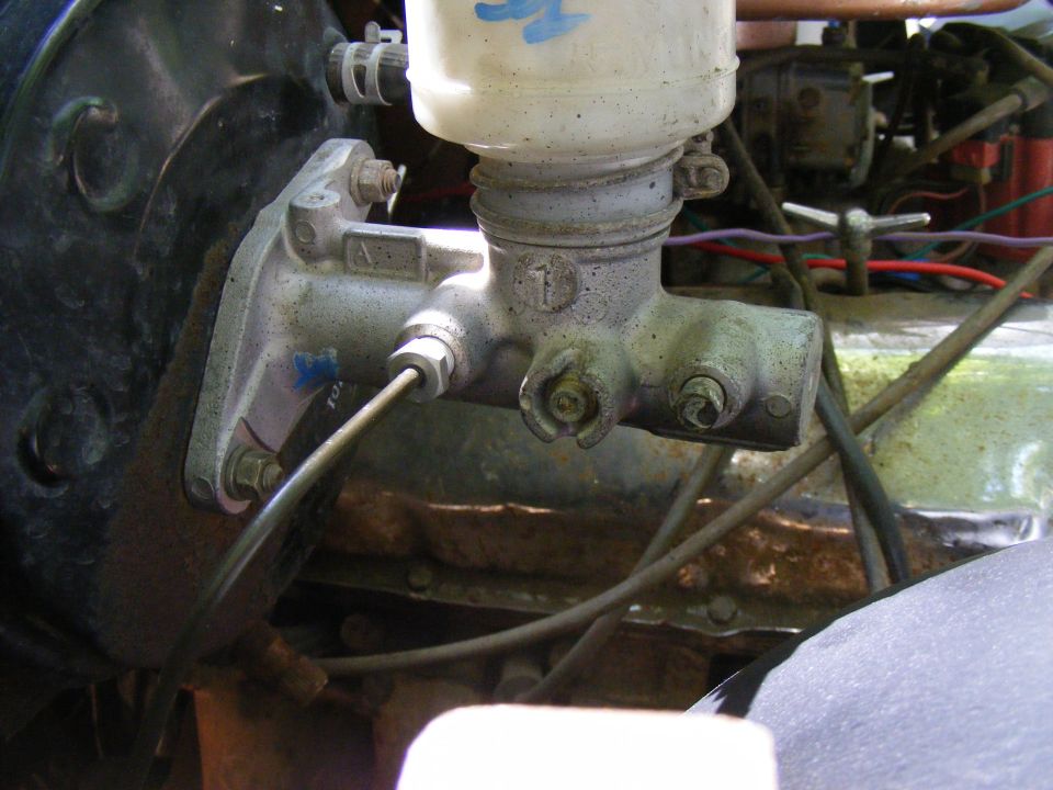 Brake master cylinder with reservoir and brake lines attached
