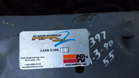 1991 Ford Bronco - Close-up of a K&N FIPK Generation II fuel injection performance kit label with handwritten notes.