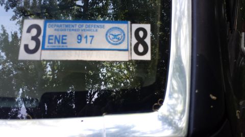 1991 Ford Bronco - A sticker on a vehicle window indicates it is a Department of Defense registered vehicle.