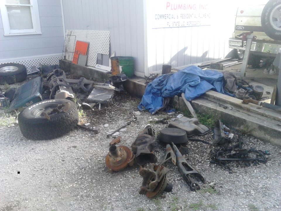 the mess of my shop with all the old parts coming off the 88 and the new parts going on from the 96. this isn't even inclueding my shed that's completely overloaded with stuff
