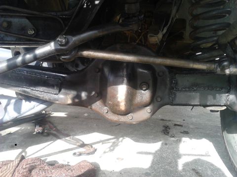 1988 Ford Bronco - driver side axle that is getting closet far from over, but is on its own weight. the beam has been reinforced and should never have a probl…