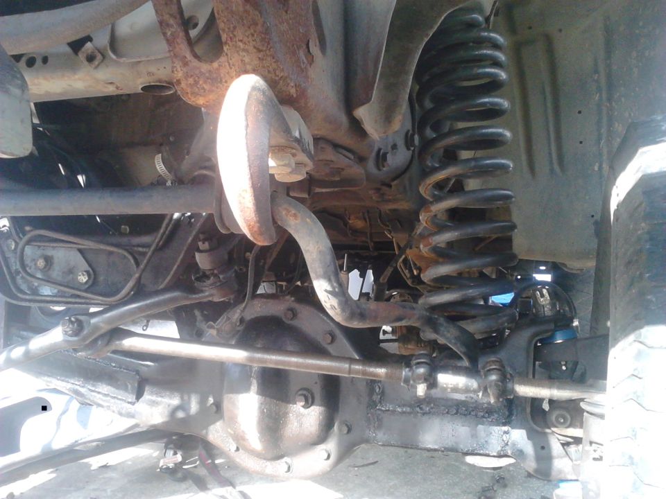 another look of the driver side suspension

still need the bumpstops, aftermarket coilbuckets, F-250 shock tower, limiting straps, and some other stuff to be done.