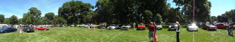 1971 Ford Ranchero - A sunny day at a car show features a variety of vehicles displayed on a grassy field.