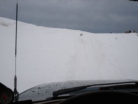 1996 Ford Bronco - Driving through a snowy landscape from the perspective of the vehicle's interior.
