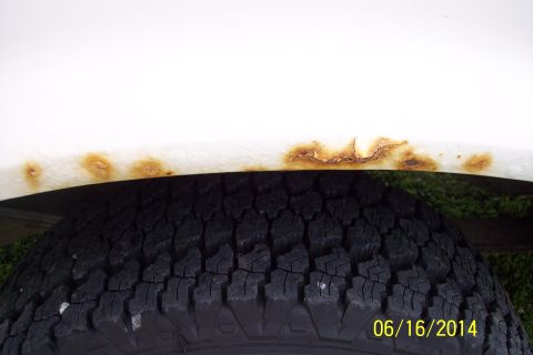 1990 Ford Bronco - Rust is visible on the fender above the tire. A date stamp indicates the photo was taken on 06/16/2004.