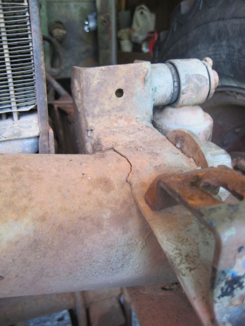 1946 Jeep Willys - Cracked weld on a heavily rusted vehicle frame component.