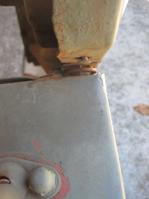 1946 Jeep Willys - Detail of a vehicle's frame and body panel connection, showing wear and rust.
