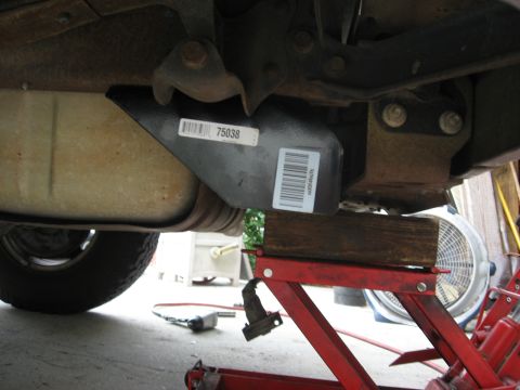 1994 Ford Bronco - Close-up view of a receiver hitch, showing part number 75038 and a barcode label.