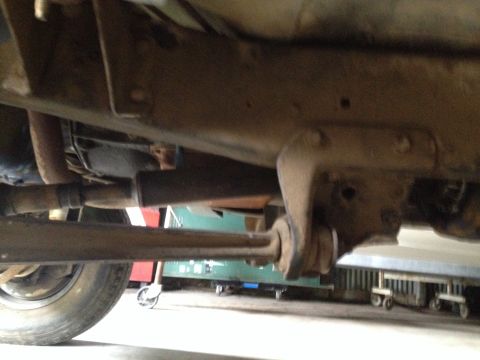 1978 Ford Bronco - Close-up of vehicle suspension and frame components, likely from the underside.