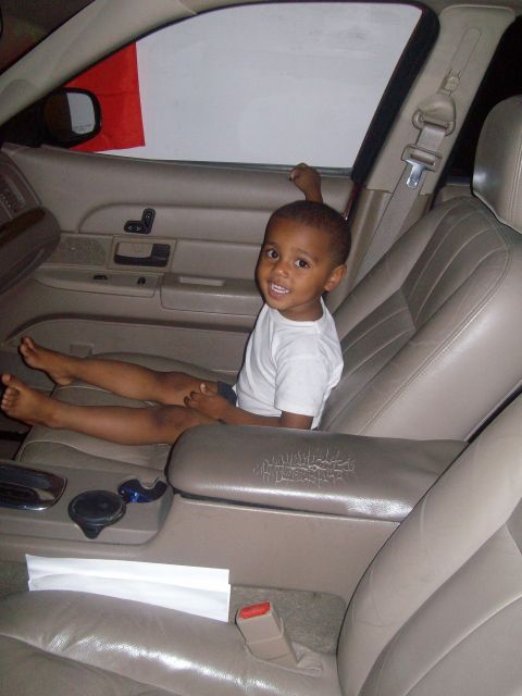 2004 Ford Crown Victoria - Youngest son enjoying the view from the garage.