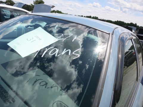 1991 Ford LTD Crown Victoria - Windshield shows handwritten notes '27K trans' and 'trans' on a paper tag reading 'ITEM 31'.