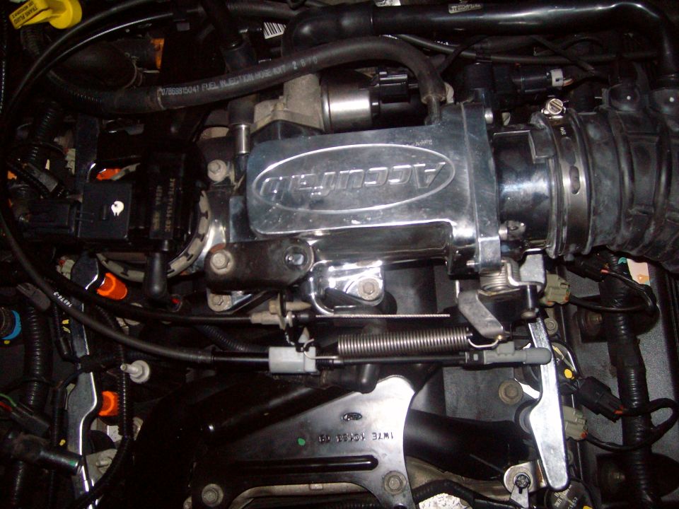 Chrome Accufab throttle body in engine bay