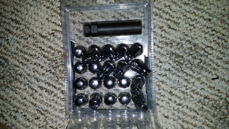 Chrome lug nuts and socket in packaging