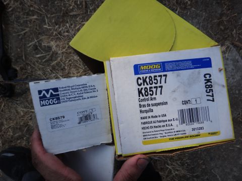 1993 Ford Taurus - Two boxes of Moog steering and suspension parts are displayed, with one box clearly showing the part number CK8577 for a control arm.