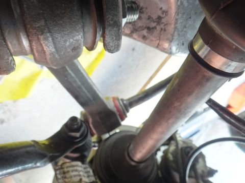 1993 Ford Taurus - This image shows a close-up view of various automotive suspension and drivetrain components.