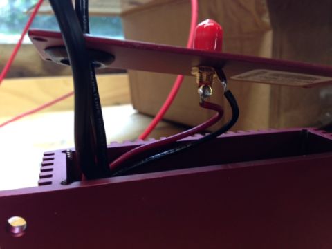 2002 Ford Mustang - Wiring connected to a red electronic component, with a Supermotors.net watermark visible.
