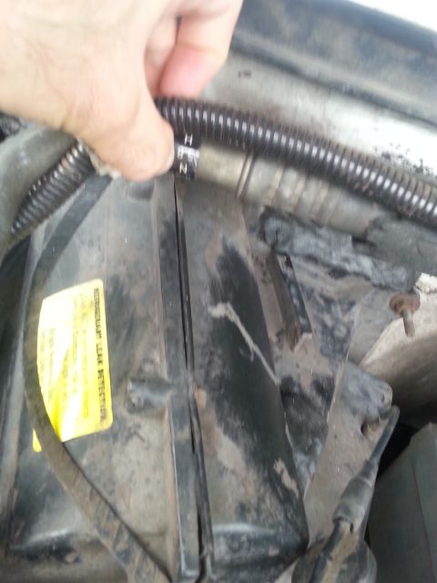 1992 Ford Bronco - there are about 6 screws that hold the cover on. some of them are in tough to reach places so you'll have to feel around the edges to find…