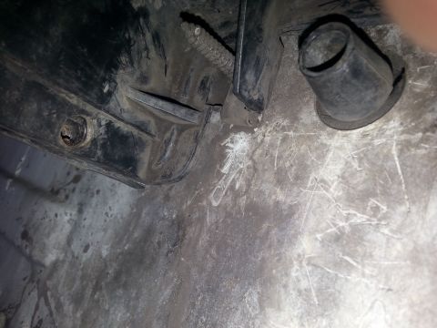 1992 Ford Bronco - Close-up view of an automotive part, possibly an evaporator box, with visible wear and tear.