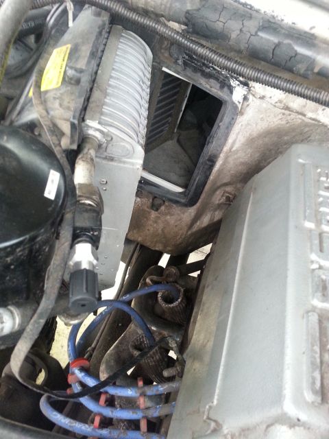 1992 Ford Bronco - once that was removed it took a bit of manipulation, but the cover finally came out and there is the evaporator. need to get another shot,…