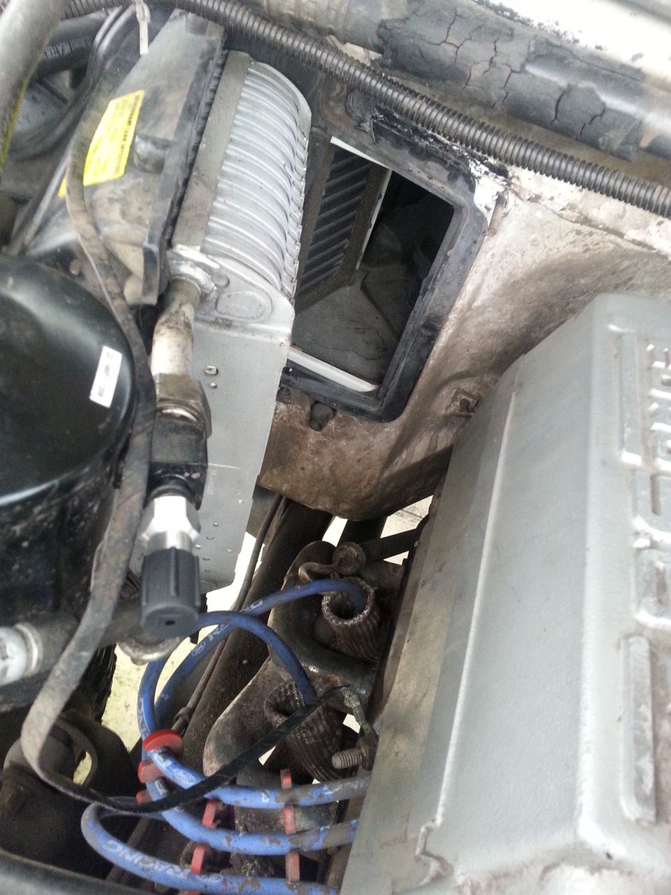 once that was removed it took a bit of manipulation, but the cover finally came out and there is the evaporator.

need to get another shot, but the coils on the evaporator were pretty clean.