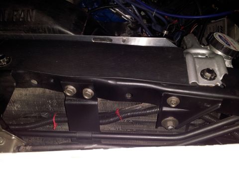1976 Ford Ranchero - Close-up view of engine bay components, including the radiator support and wiring.
