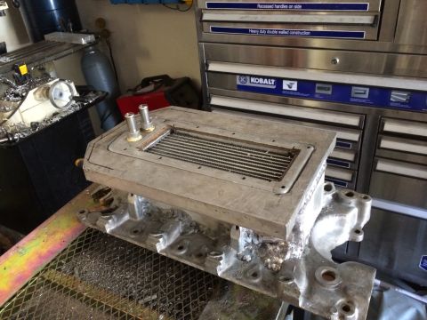 1996 Ford Bronco - Custom supercharger assembly with intercooler and fittings, likely for a performance vehicle build.