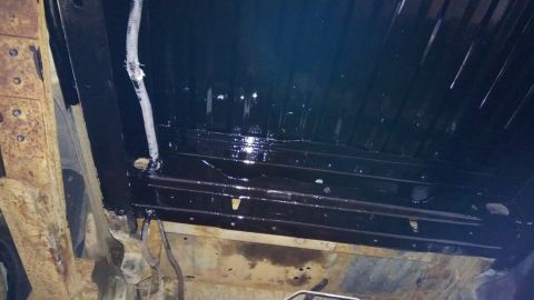 1983 Ford Bronco - Vehicle underbody after frame and crossmember coating application.