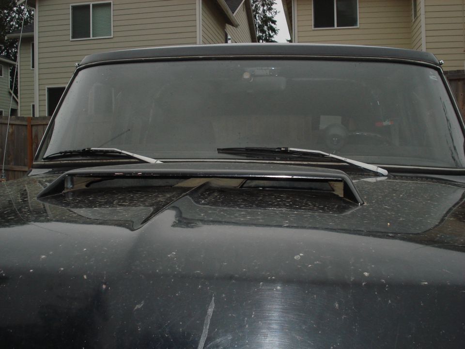 Black hood and windshield with scoop