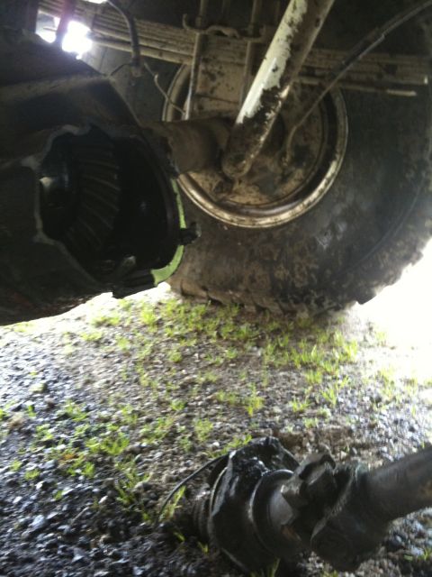 1979 Ford Bronco - Vehicle's rear differential and axle components are exposed, suggesting repair or maintenance.