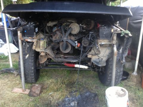 1979 Ford Bronco - Front view of a vehicle's engine bay, showing mechanical components and suspension.