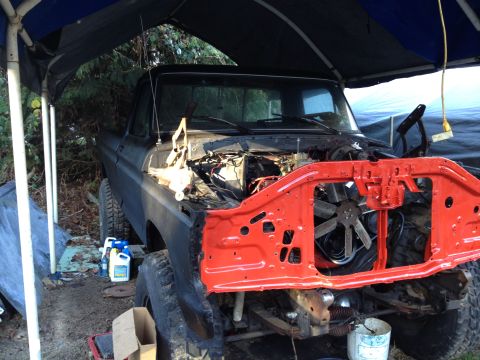 1979 Ford Bronco - This 1979 Ford Bronco is undergoing repairs or restoration, with its engine bay exposed.