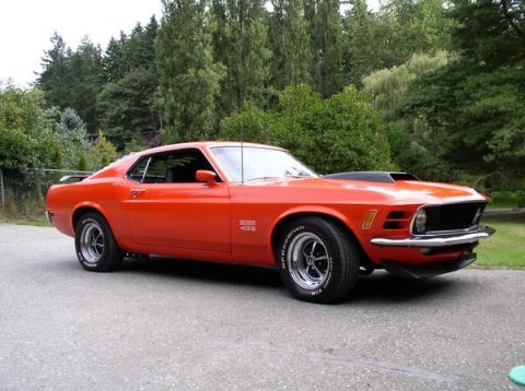 1979 Ford Bronco - This 1970 Ford Mustang Boss 429 is shown in a 3q front view, a prominent hood scoop and classic muscle car styling.