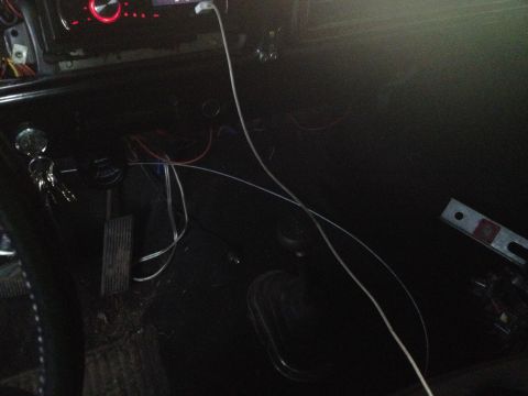 1979 Ford Bronco - A dark, close-up view of the interior of a vehicle, with no clear identifying features visible.