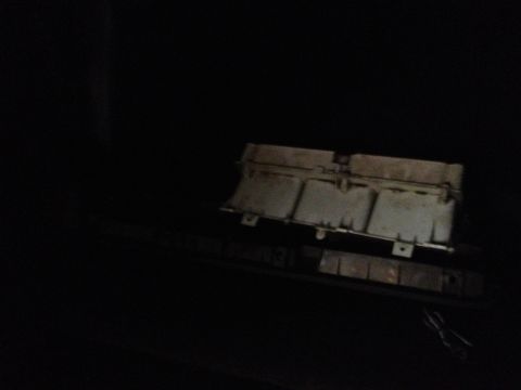 1979 Ford Bronco - An engine component is visible in the dark, with a Supermotors watermark at the bottom right.