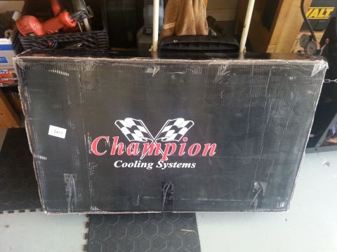 1992 Ford Bronco - Got my new Champion 4 core monster radiator..$310 shipped to my door. This thing is huge. definitely a good bit thicker than the current on…