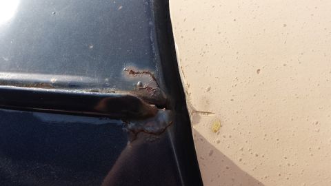 1984 Ford Bronco - Driver's side gutter seam.