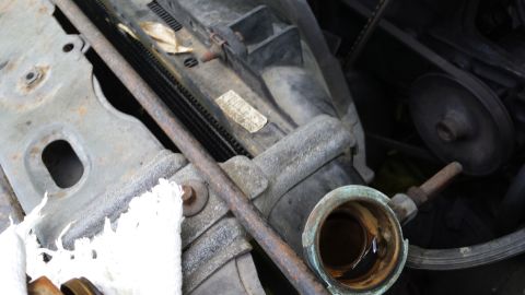 1984 Ford Bronco - Close-up view of the engine bay, focusing on the radiator and associated components.