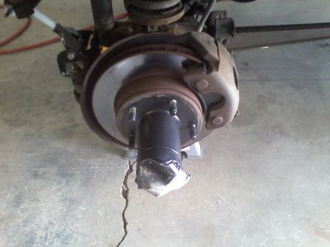 1978 Ford Bronco - Vehicle brake system components, including rotor and caliper, are visible.