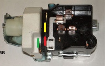 1967 Pontiac Grand Prix - Close-up view of an electrical switch, likely for a vehicle's lighting system, with colored markings.