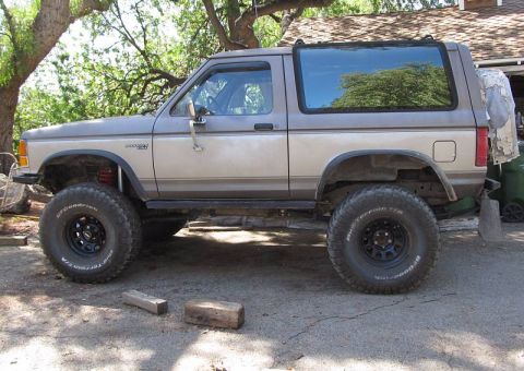 1990 Ford Bronco II - New 64'' Pro-Comp Chevy springs installed (#13211, 3.5''). For some reason I kept bending stock-fitment springs near the forward eye (did i…