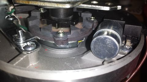 1984 Ford Bronco - Interior view of a vehicle's distributor cap and rotor assembly.