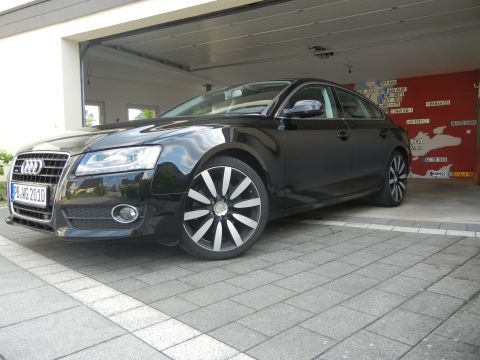 2010 Audi A4 - 2010 Audi A4 sedan with custom wheels parked in a driveway.